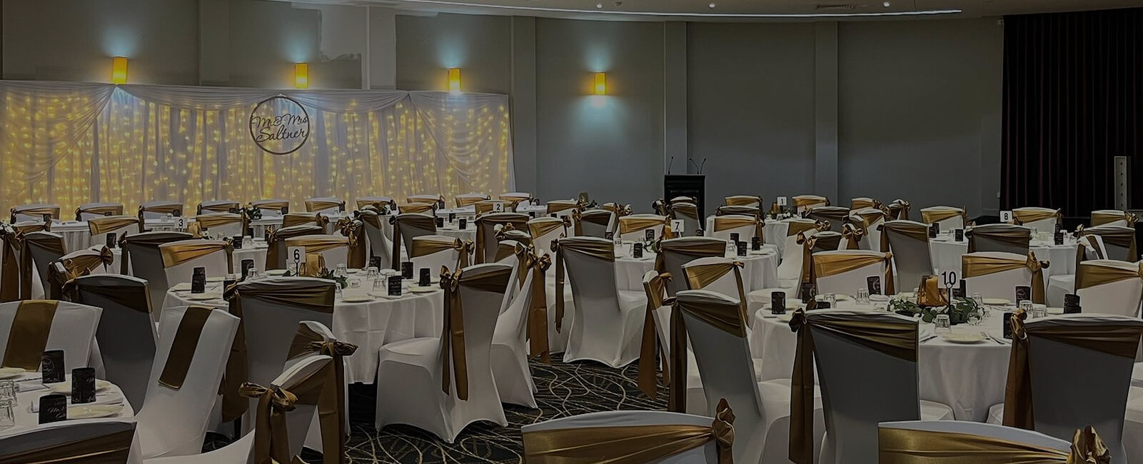 Sails Function Room set up with beautiful white and gold wedding