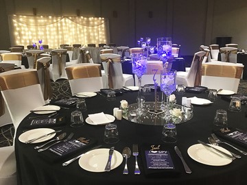 Large function with black and gold detailing