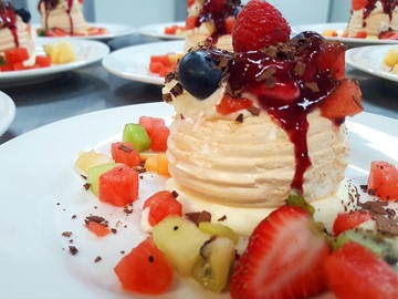 Fruit salad dessert on plate for catering event
