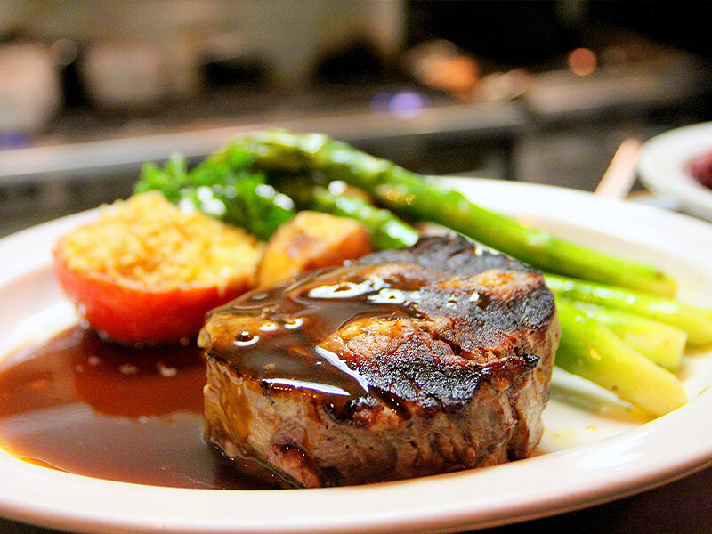 Fresh dinner with meat and veggies at outdoor catering event