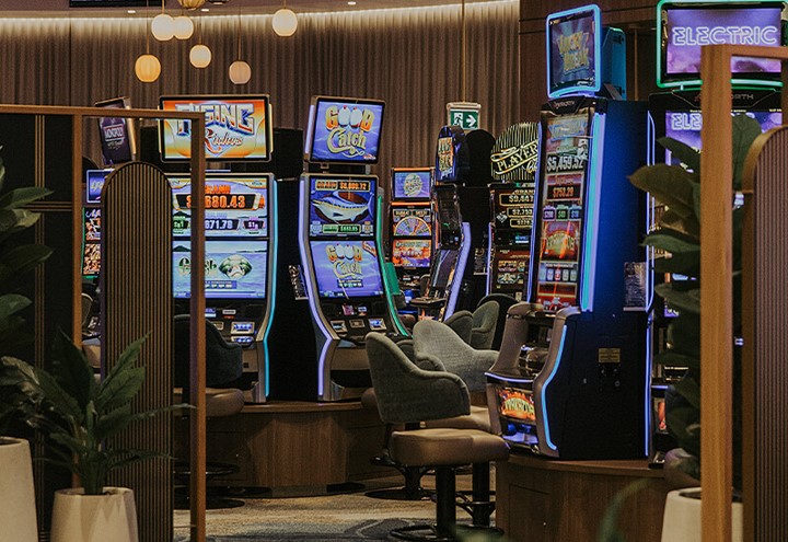 View of pokies in the Opulence Gaming Room at The Waves Bundaberg