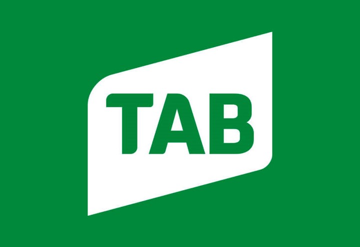 White TAB logo on green background