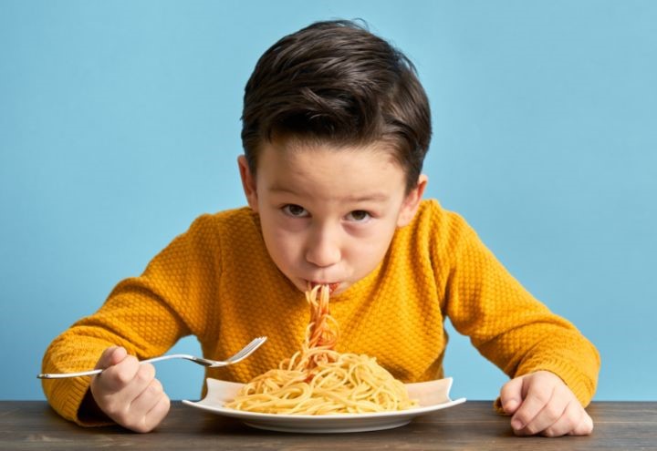 Child eating spaghetti